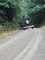 gravel road with tractor